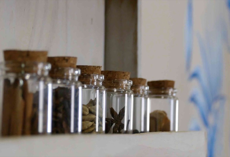 Botanical ingredients in glass jars